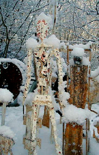metal figures in snow