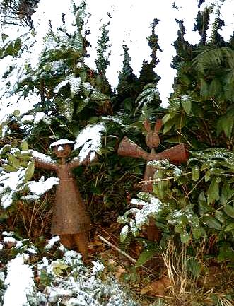 metal figures in snow